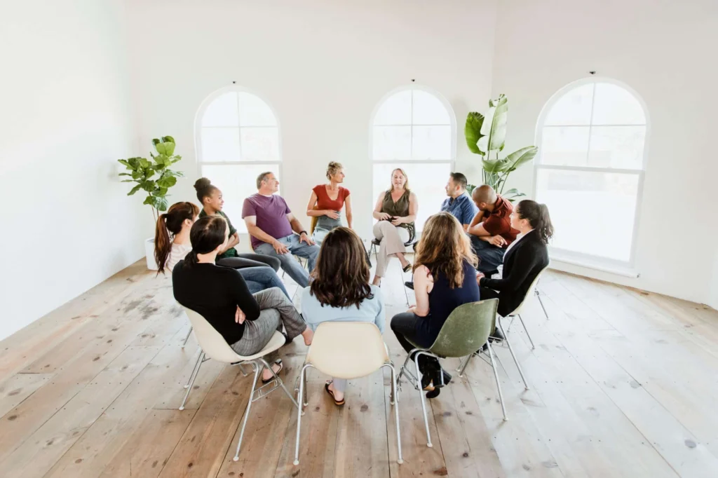 Diverse people in a supporting group session